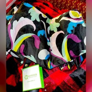 Brand new umbrella with tags.